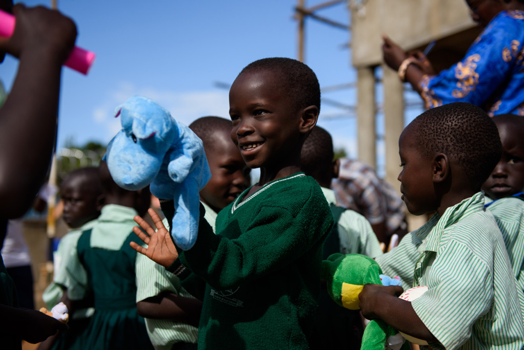 Children in the community, smiling
